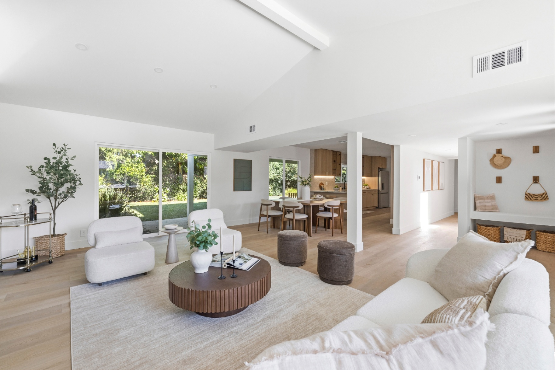 Open living and dining flow at 6646 Petit Ave